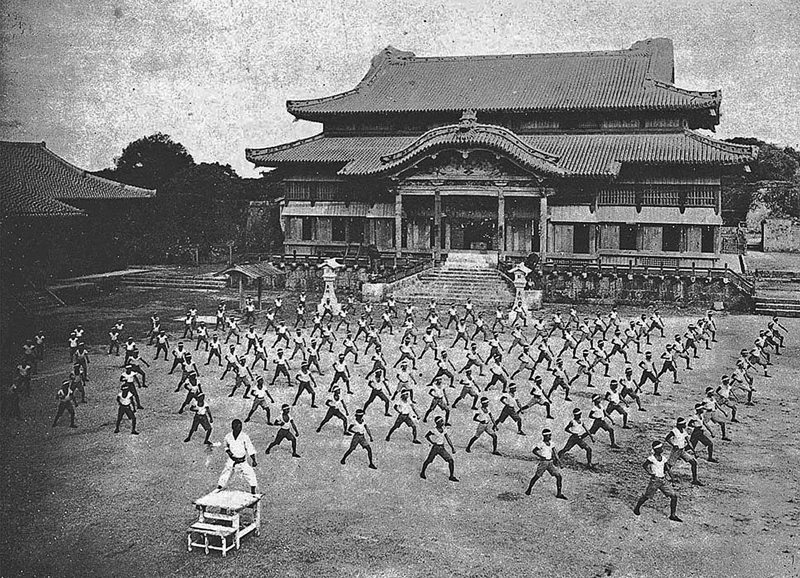 Karate students training in front stance at Shuri Castle, c. 1938