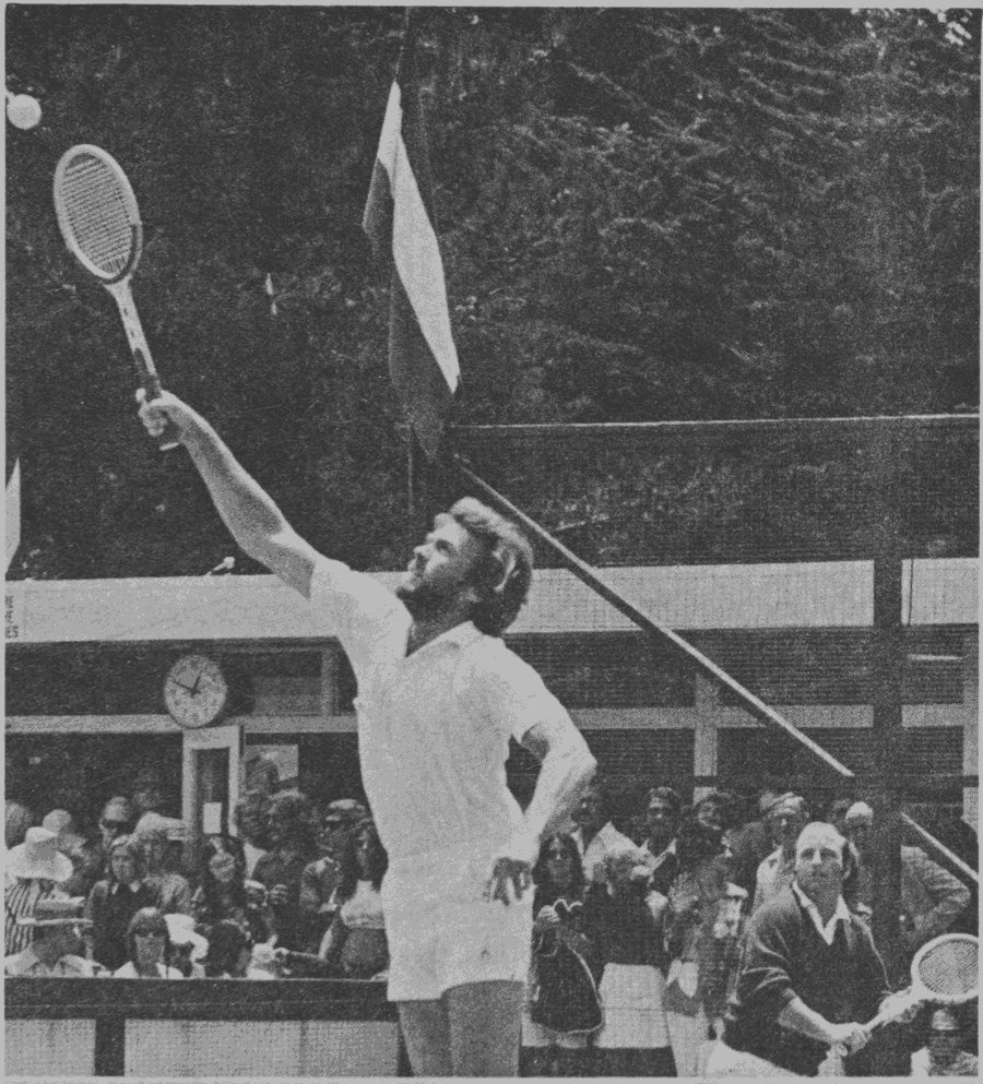 Clint Eastwood jumps to return a shot during the Invitational Celebrity Tournament at The Beach & Tennis Club in Pebble 
